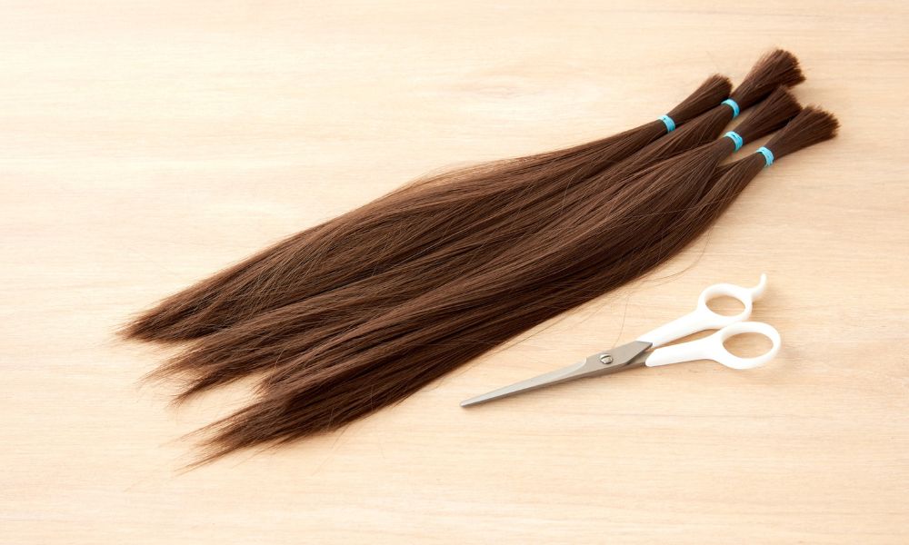 póthaj felrakás emberi hajból készült pótlás